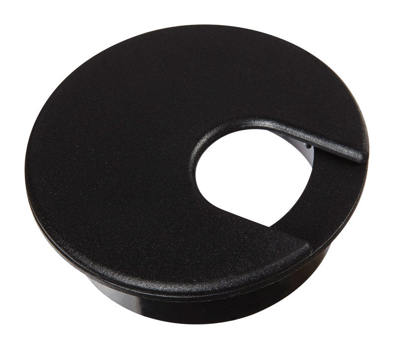 Black 2-inch desk grommet from Emery Jensen for computer accessories, shown installed in a desk for cable management.