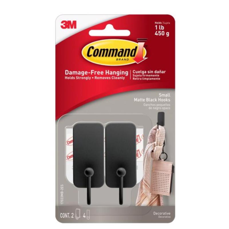 Two small black plastic decorative hooks by Emery Jensen, ideal for organizing or decorating spaces.