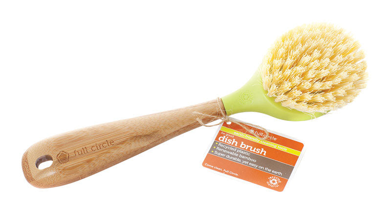 Green Emery Jensen dish brush with sturdy handle, designed for cleaning dishes and pans effectively.