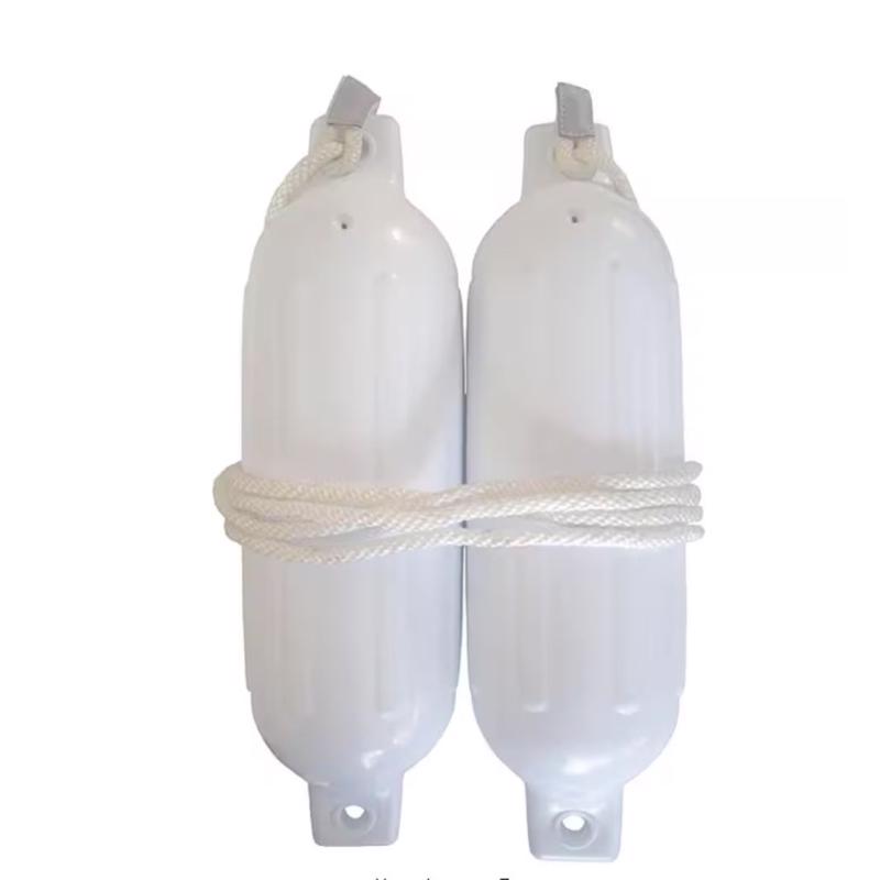 White 23-inch vinyl boat fender by Emery Jensen, used as a docking equipment to protect boat sides from impact.