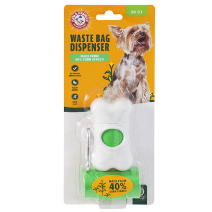 Green Emery Jensen dog waste bag dispenser with attached waste bags for easy clean-up during walks.
