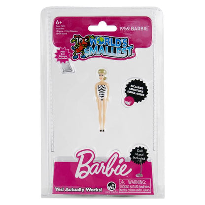 Small Barbie doll by Emery Jensen from the dolls/action figures collection, featuring a classic pose and bright clothing.