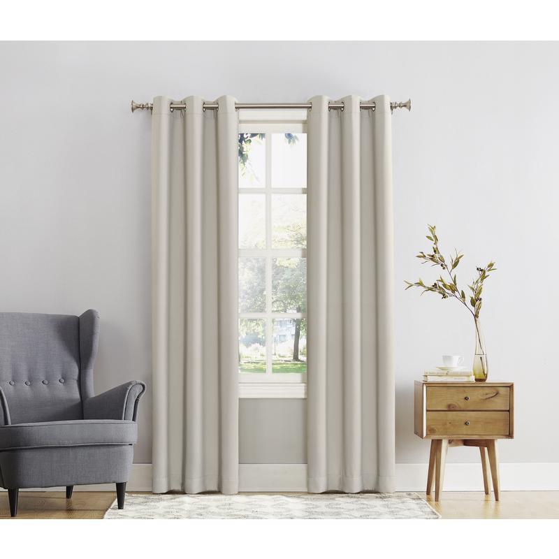 Emery Jensen Norwich Curtains Ivy 2-Pack drapery with leafy green pattern hanging in a living room window.