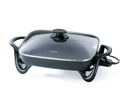 Emery Jensen 16-inch electric skillet with glass cover, non-stick cooking surface, and adjustable temperature control.