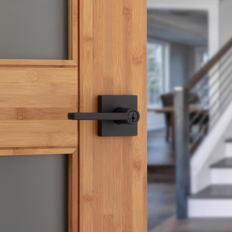 Emery Jensen keyed entry lever in square design, installed on a door, featuring a secure lock mechanism for residential use.