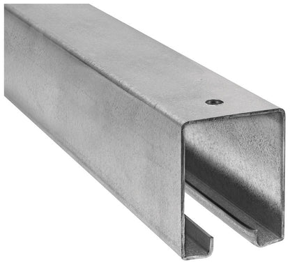 Emery Jensen 12-foot exterior barn door hardware with box rail and glass panels for rustic barn-style interior or exterior doors.