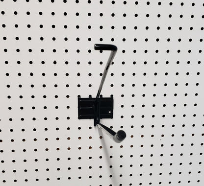 Emery Jensen black broom hook fitting, wall-mounted fixing for organizing brooms and cleaning tools.