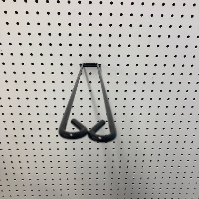 Emery Jensen 18-inch broom loop hook fixture for organizing and hanging cleaning tools on walls.