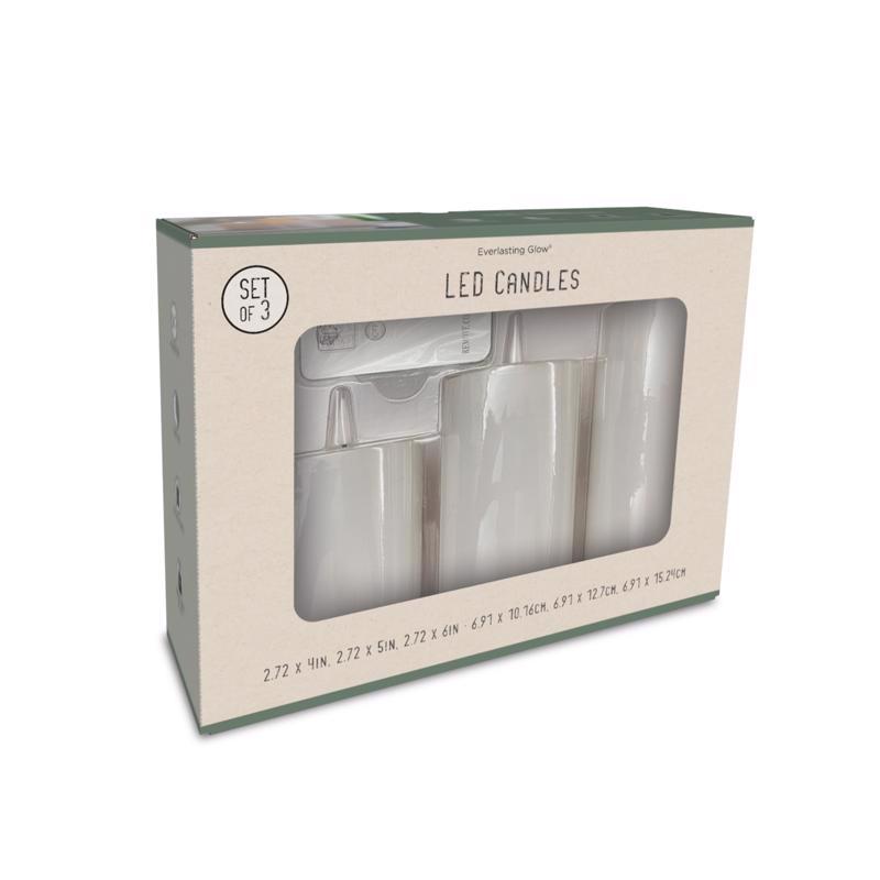 Set of three Emery Jensen flameless candles in white, featuring realistic flickering flame effects for a cozy ambiance.