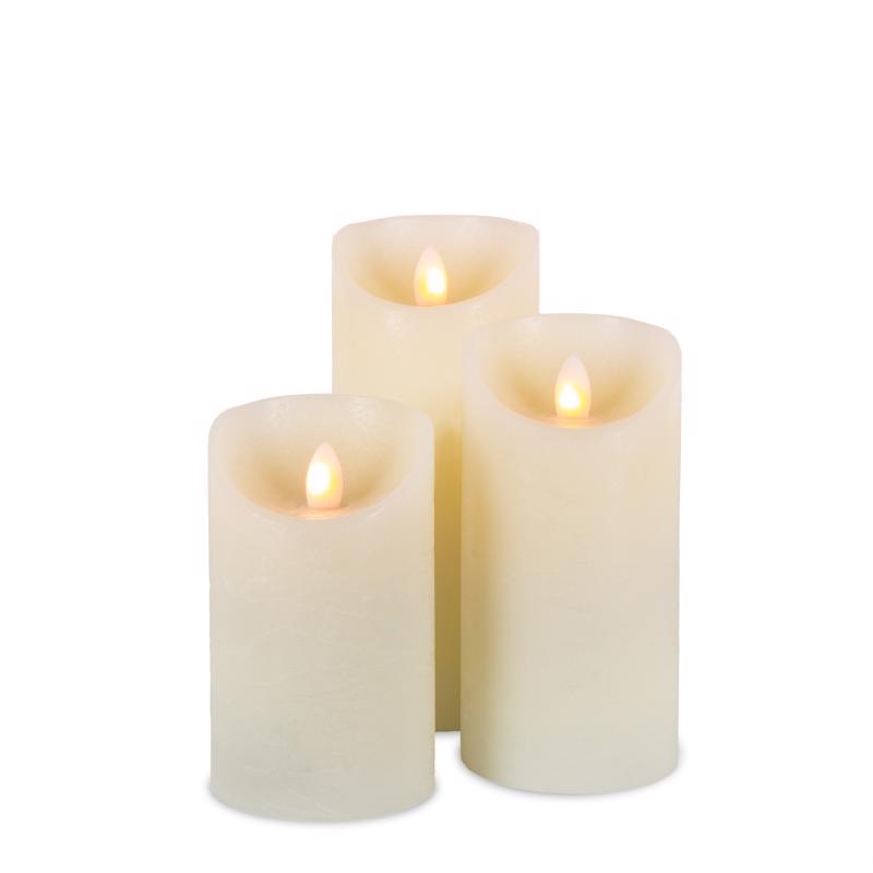 Set of three Emery Jensen flameless LED candles with realistic flickering flame effect for safe, ambient lighting.
