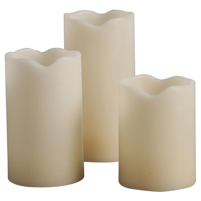 Emery Jensen melted edge pillar flameless candle with a warm, realistic glow and textured melted edge design.