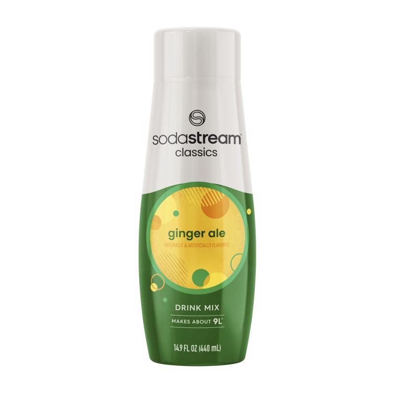 Emery Jensen SODAMIX Ginger Ale flavor mix in a clear bottle with a golden label, showcasing fresh ginger root and lime slices.