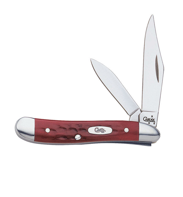 Emery Jensen PKT folding knife with a 2.87-inch peach-colored blade, compact and versatile for everyday carry.