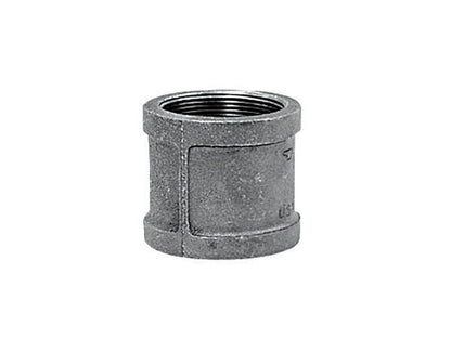 Emery Jensen couple mall 1-inch galvanized iron fittings U.S., showing close-up of the galvanized metal surface and fittings.
