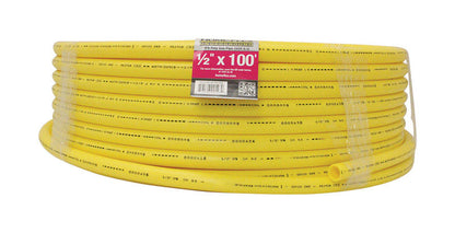 Emery Jensen underground 1/2x100ft yellow gas connection access hose laid out on a surface.