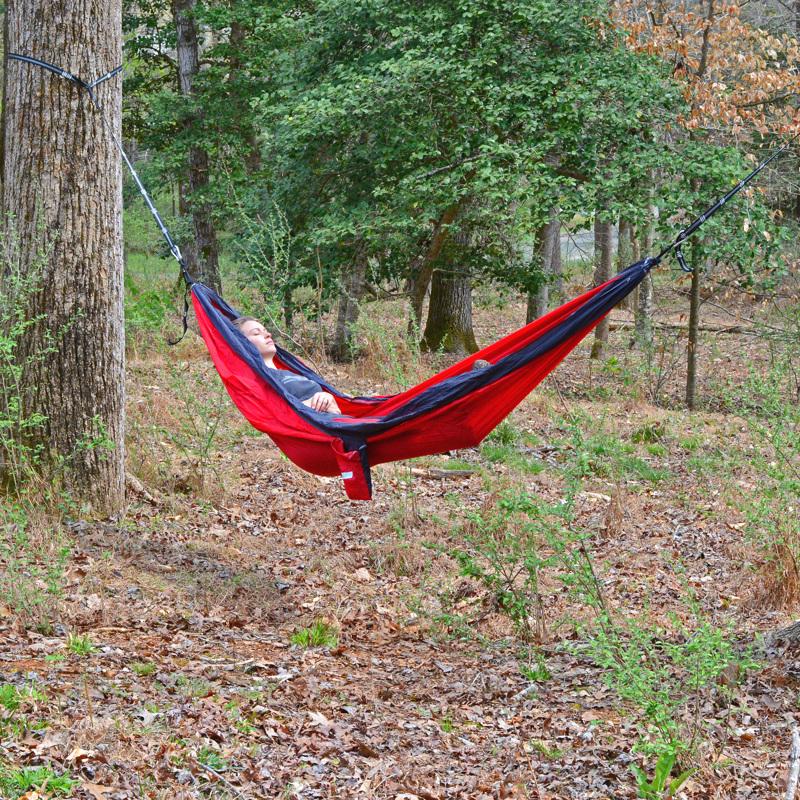 Red nylon hammock from Emery Jensen, 10-foot outdoor hammock with sturdy fabric and comfortable design.
