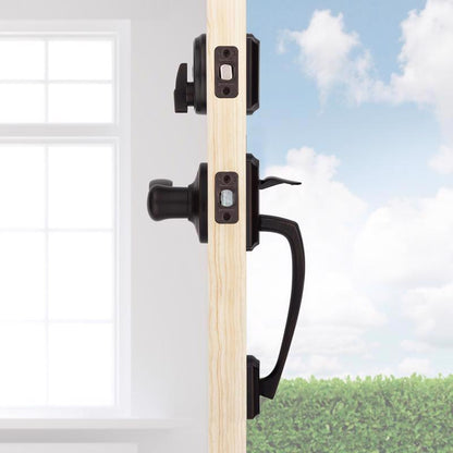 Emery Jensen entry handle set in vintage bronze finish, featuring a door handle and matching hardware for traditional style.