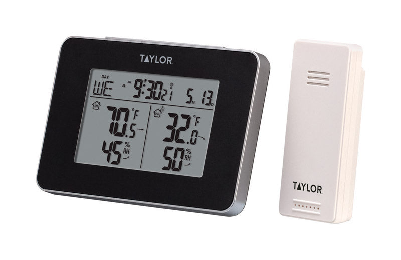 Wireless humidity and home thermometer from Emery Jensen, displaying digital readout of temperature and humidity levels.