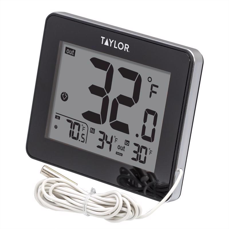 Emery Jensen wired home thermometer showing indoor and outdoor temperature readings with a digital display.