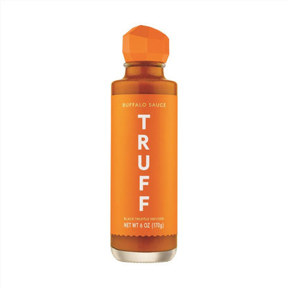 Emery Jensen hot sauce bottle with black truffle and buffalo flavor, featuring a vibrant label and a squeeze top cap.