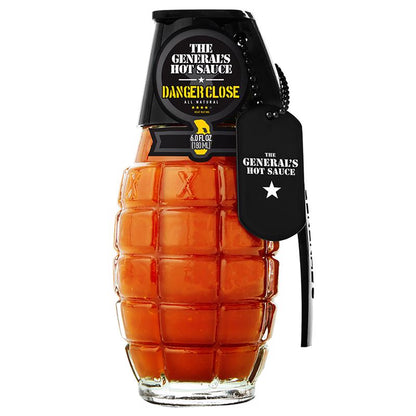 Emery Jensen Danger Close hot sauce in a 6oz bottle, featuring a fiery red chili pepper design on the label.