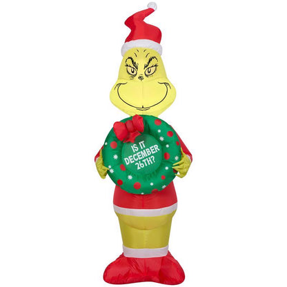 Emery Jensen Inflatable Grinch decoration, 4-foot tall inflatable character for holiday displays and outdoor Christmas decor.