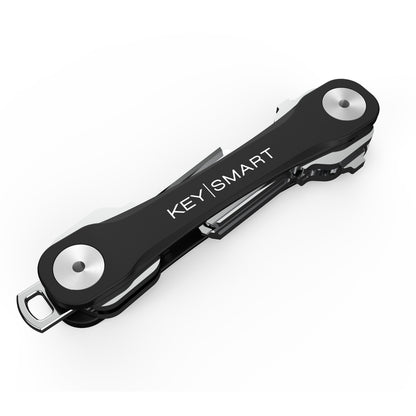 Emery Jensen KeySmart black key holder with multiple key rings organized for easy access and compact storage.
