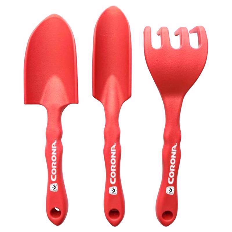 Emery Jensen kids garden tool set with three red gardening tools including a trowel, rake, and shovel for children.