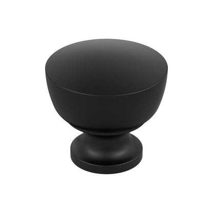 Black Emery Jensen CBNT KNB knob with 1-1/8 inch diameter, featuring a sleek, round design for cabinet or furniture use.