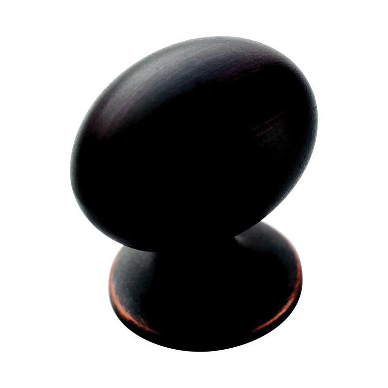 Large Emery Jensen oversized orb knobs, close-up of smooth round black ceramic cabinet handles for furniture or drawers.