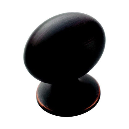 Large Emery Jensen oversized orb knobs, close-up of smooth round black ceramic cabinet handles for furniture or drawers.