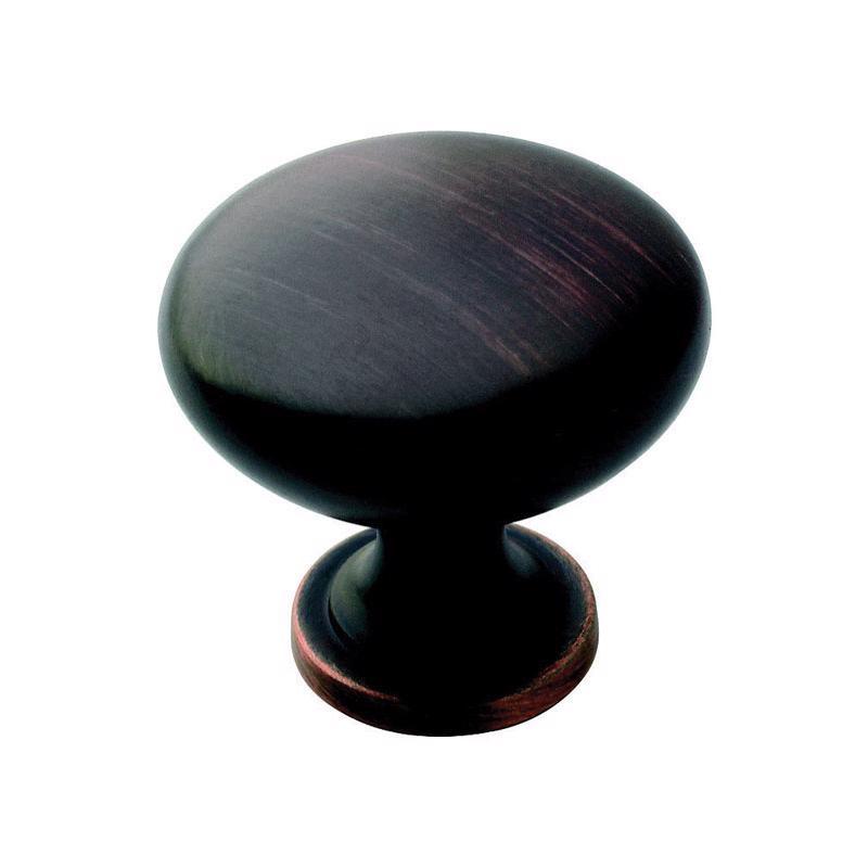 Round bronze knob measuring 1-1/4 inch from Emery Jensen, ideal for cabinets and furniture.