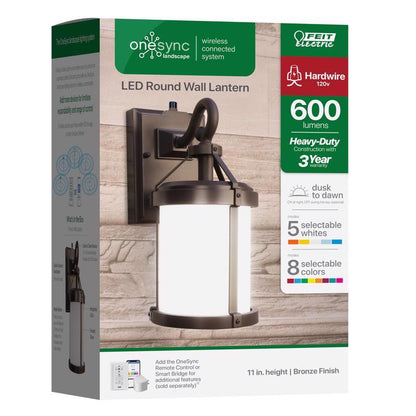 Round 11-inch Emery Jensen LED integrated wall lantern with a sleek exterior design and clear glass panels.