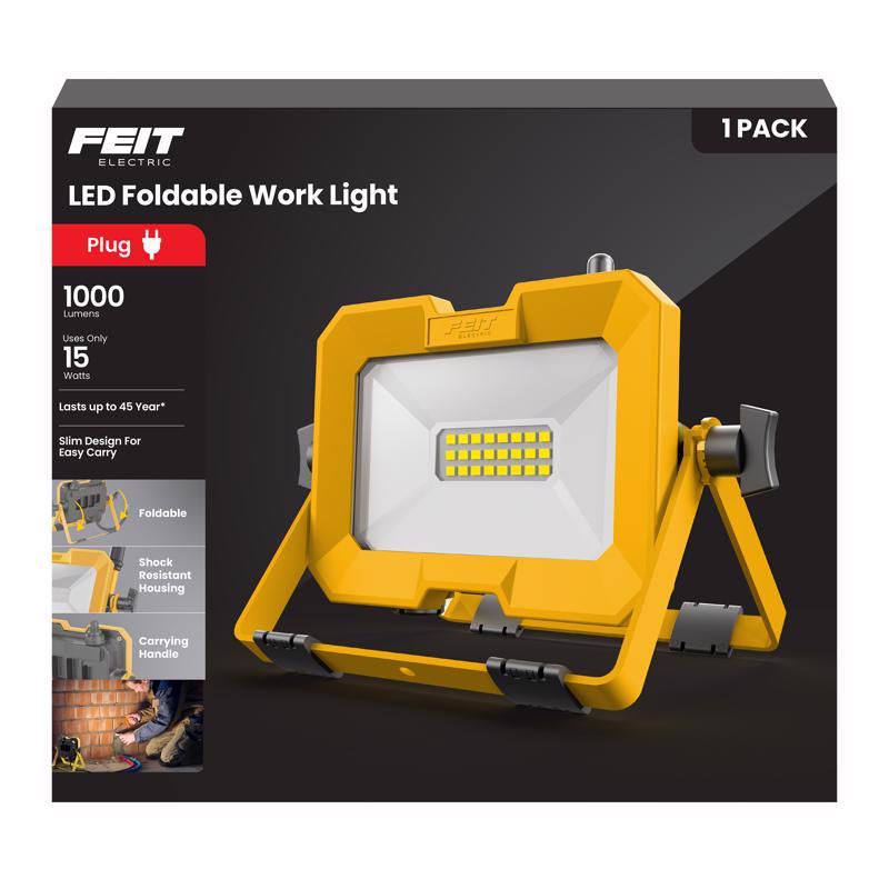 Emery Jensen 15W LED work light with a durable rectangular metal housing and adjustable stand for outdoor or workshop use.