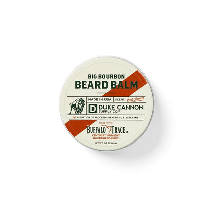 Emery Jensen beard balm in oak barrel scent, skin care product with natural ingredients, displayed in a jar with a wooden lid.