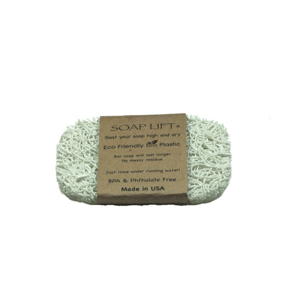 Emery Jensen Soap Lift White lip balm and skin care product with sleek white packaging and minimalist design.