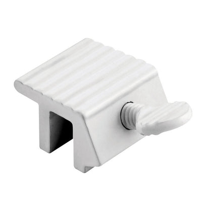 White sliding window lock by Emery Jensen, showing the secure locking mechanism for window safety and security.