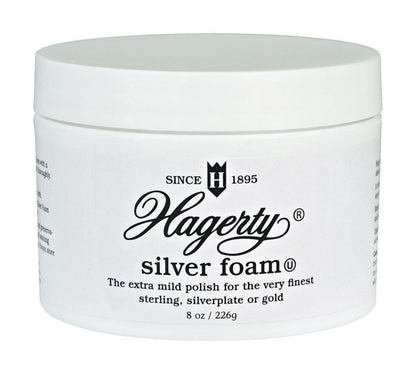 Silver foam metal polish from Emery Jensen, 8oz container, used for cleaning and shining metal surfaces.