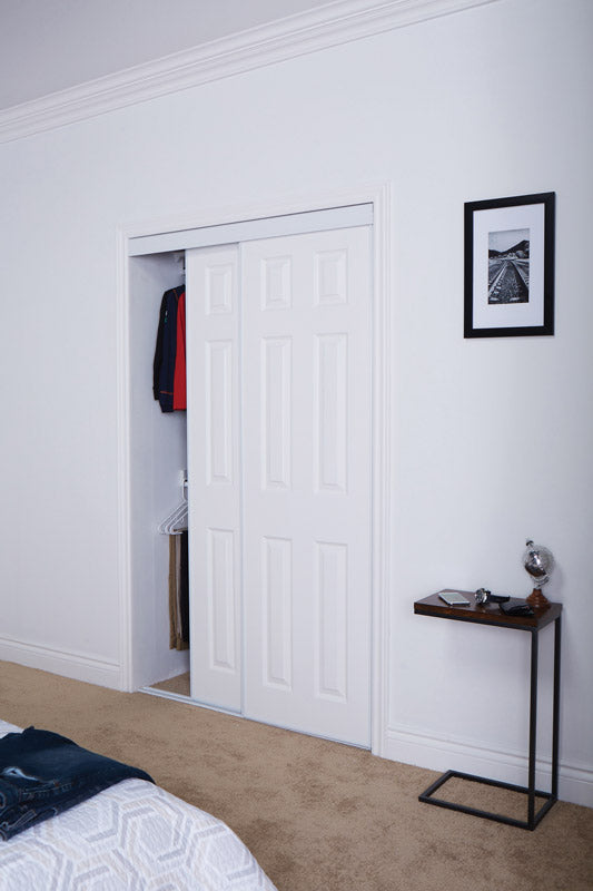 Emery Jensen mirrored bypass door 48x80.5 inches, featuring sleek glass panels and modern design for closet or room entry.