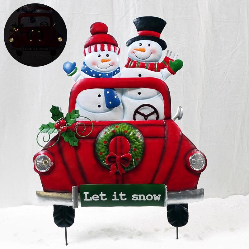Emery Jensen CMAS snowman in car metal outdoor Christmas decor, festive holiday decoration for outdoor display
