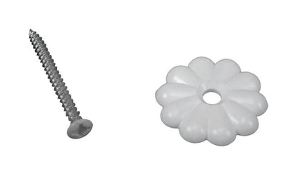White plastic button rosette for mobile home parts by Emery Jensen, shown on a mobile home wall.