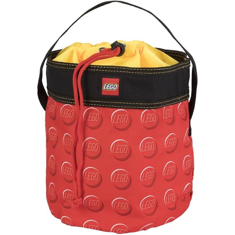Red LEGO bucket plastic storage container by Emery Jensen, ideal for building kits and accessories.