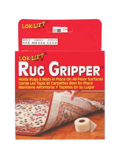 Emery Jensen Lok-lift Rug Gripper non-slip rug pads on a floor, preventing slipping and protecting surfaces.