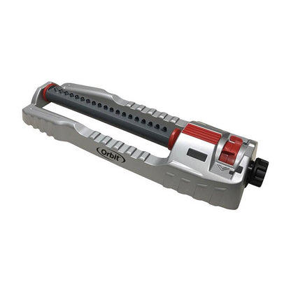 Emery Jensen oscillating sprinkler model 4000SF watering lawn with adjustable spray pattern and range.