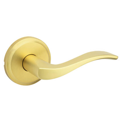 Emery Jensen passage lever handle in matte black finish, installed on interior door for easy opening and closing.