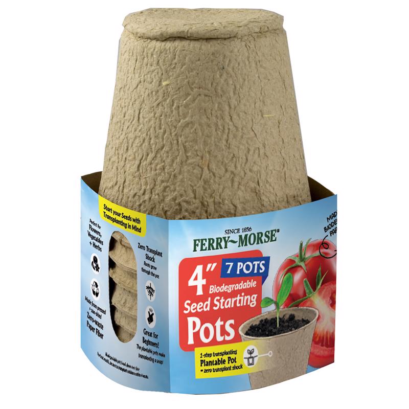 Set of seven Emery Jensen Seed Startr 4-inch peat pots for starting plants and seedlings, ideal for seedling growth.