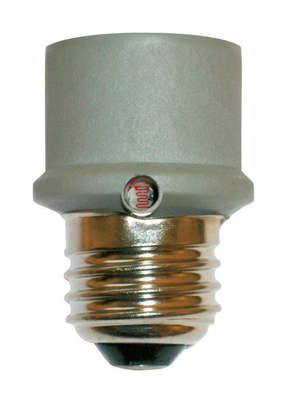 Emery Jensen dusk/dawn photoelectric switch for automatic outdoor light control, shown mounted on exterior wall.