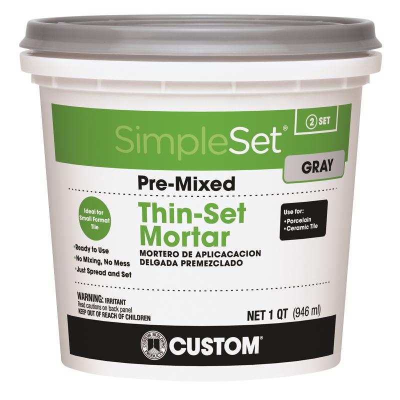 Emery Jensen ceramic premixed thin-set grout in gray color, suitable for tile installation, shown in a close-up image.