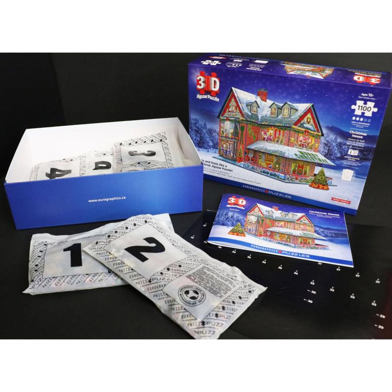 Emery Jensen 3D Jigsaw Puzzle featuring Chris Hous, colorful puzzle pieces forming a detailed 3D image.