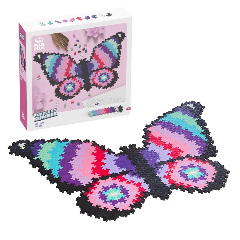 Emery Jensen 800-piece butterfly puzzle showing colorful butterfly and floral design on assembled puzzle pieces.